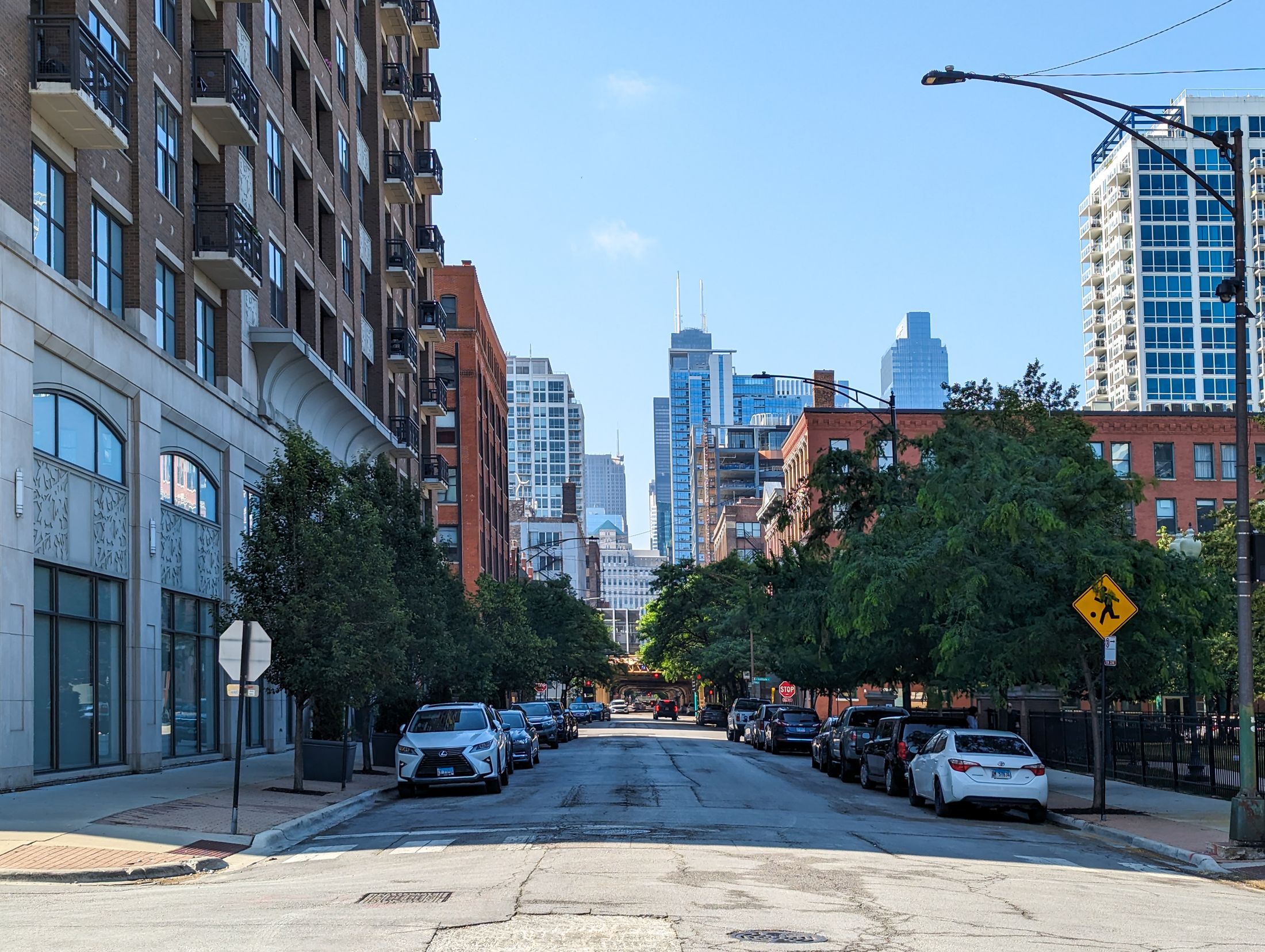 Chicago residential streetscape with mixed historic and modern architecture